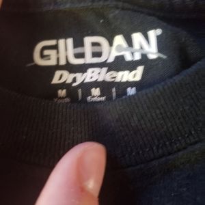 Black and white t-shirt that has a moster truck